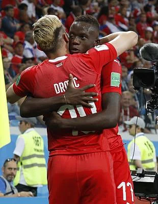 NIZHNY NOVGOROD, June 27, 2018 (Xinhua) -- Josip Drmic (L) of Switzerland celebrates his scoring with his teammate during the 2018 FIFA World Cup Group E match between Switzerland and Costa Rica in Nizhny Novgorod, Russia, June 27, 2018. The match ended in a 2-2 draw. Switzerland advanced to the round of 16. (Xinhua/Ye Pingfan/IANS)