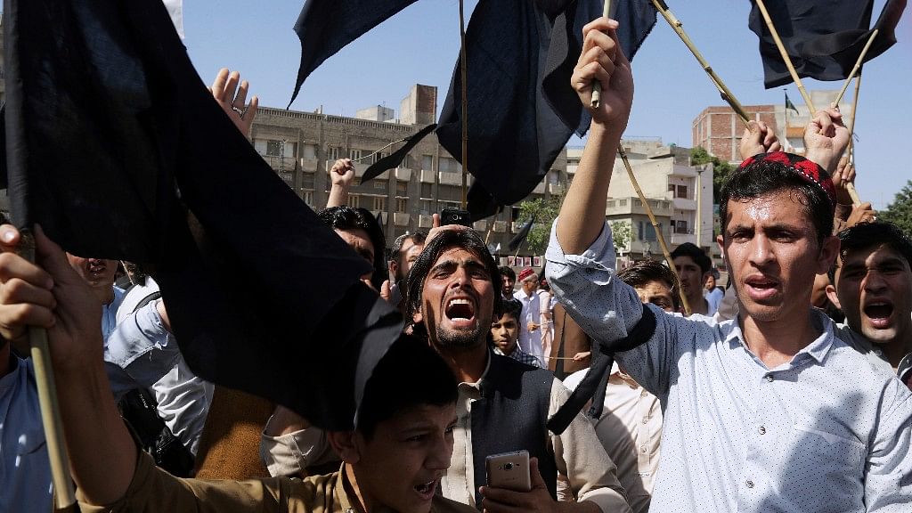 Supporters of Pashtun Protection Movement chant slogans during a rally in Lahore, Pakistan.