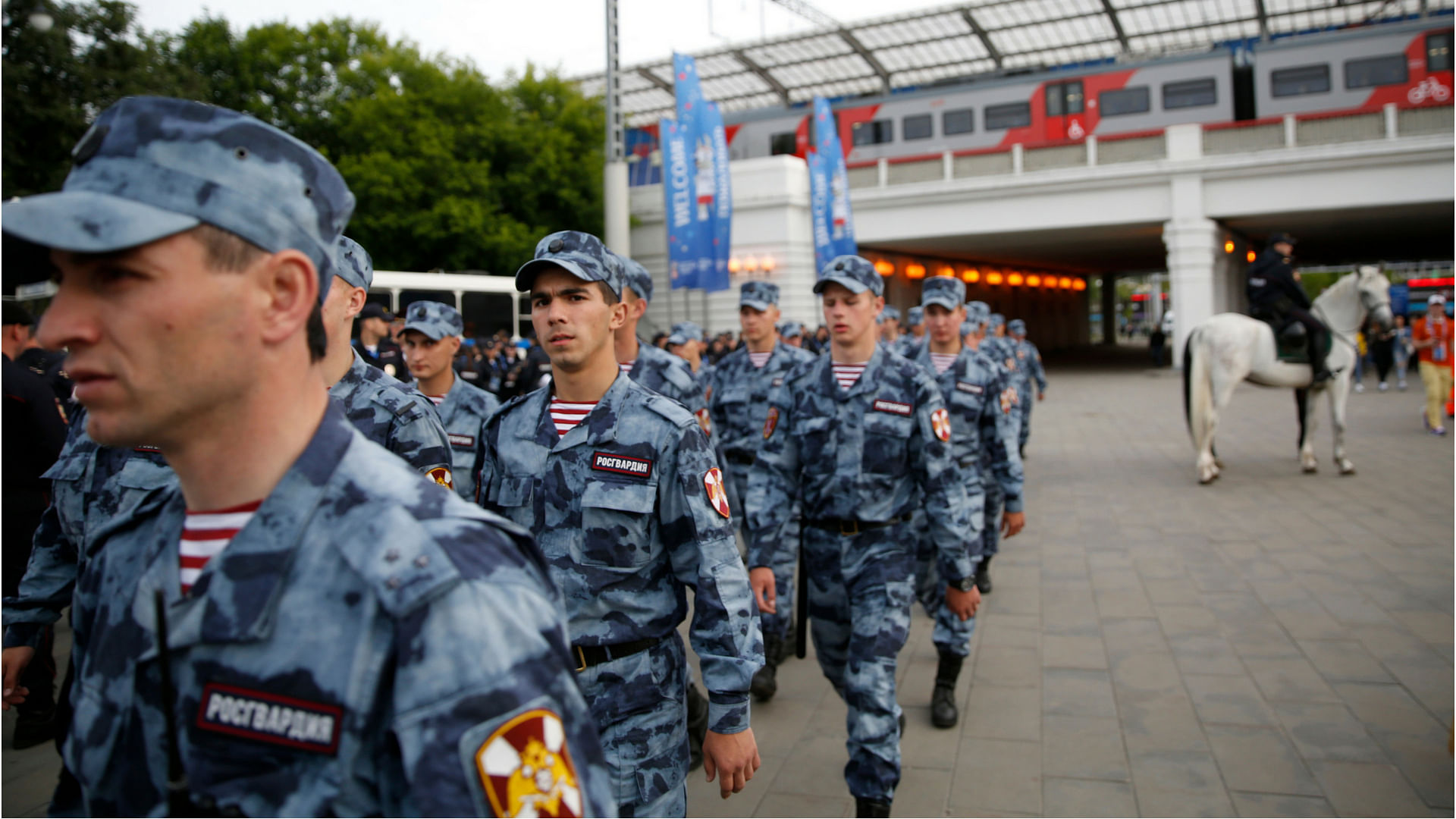 Russian soldiers are out in full force near World Cup venues, here securing Luzhniki stadium before the opener