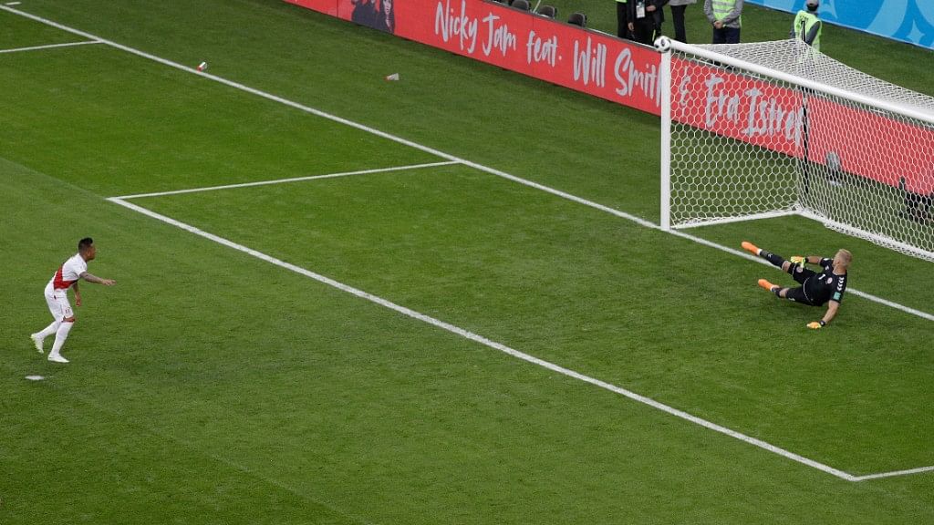 Peru’s Christian Cueva shot his penalty kick, awarded after VAR consultation, over the bar just before the halftime.