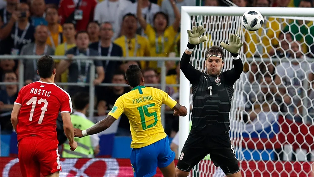 Brazil’s Paulinho (middle) scores past Serbia goalkeeper Vladimir Stojkovic his side’s first goal during their Group E match at the Spartak Stadium in Moscow on Wednesday.