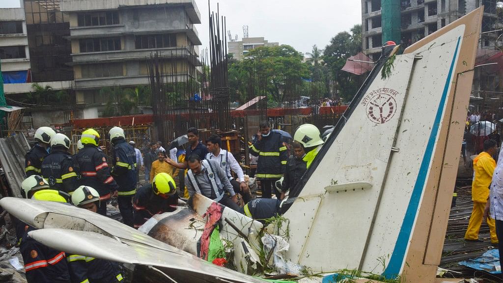 The plane hit an open area at a construction site for a multi-story building in a crowded area with many residential apartments.