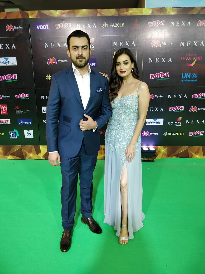 Dia Mirza looks stunning in a steel grey slit gown alongside husband, Sahil Sangha. 