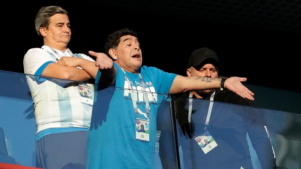 Argentina former soccer star Diego Maradona waves to the fans ahead of the Group D match between Argentina and Nigeria at the St. Petersburg Stadium on Tuesday.