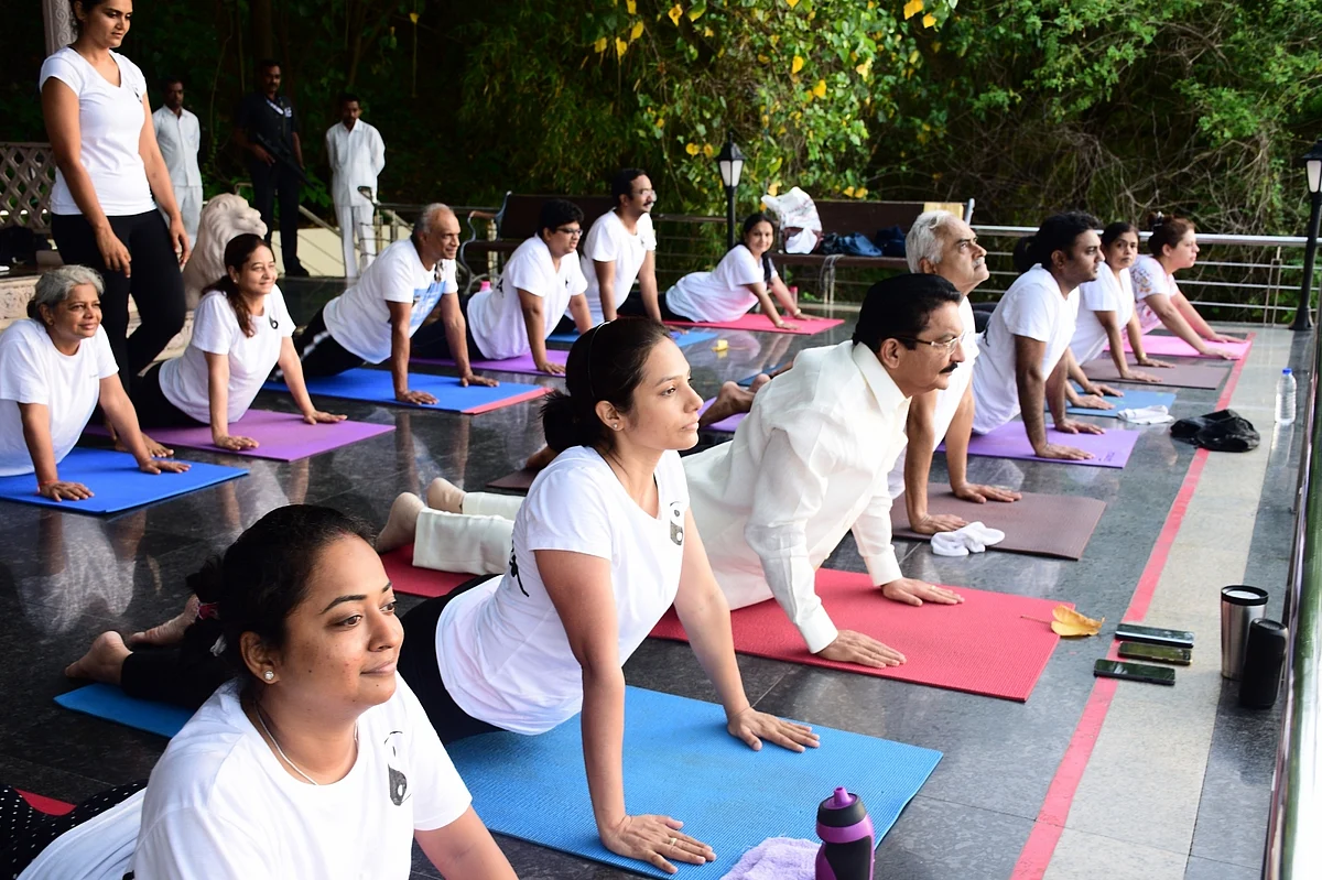 Maharashtra Governor C Vidyasagar Rao practices yoga ‘asans’ (postures) on the Fourth International Yoga Day at Raj Bhawan in Mumbai.