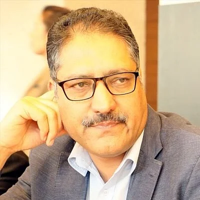 Srinagar: Senior journalist and Editor-in-Chief of English daily "Rising Kashmir" Shujat Bhukhari who was shot dead by militants outside his office in Srinagar, on June 14, 2018. (Photo: IANS)