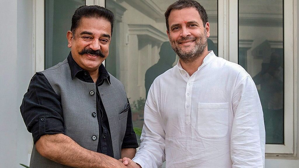 Congress President Rahul Gandhi and actor-turned politician Kamal Haasan shake hands during a meeting in New Delhi on Wednesday, 20 June 2018.&nbsp;