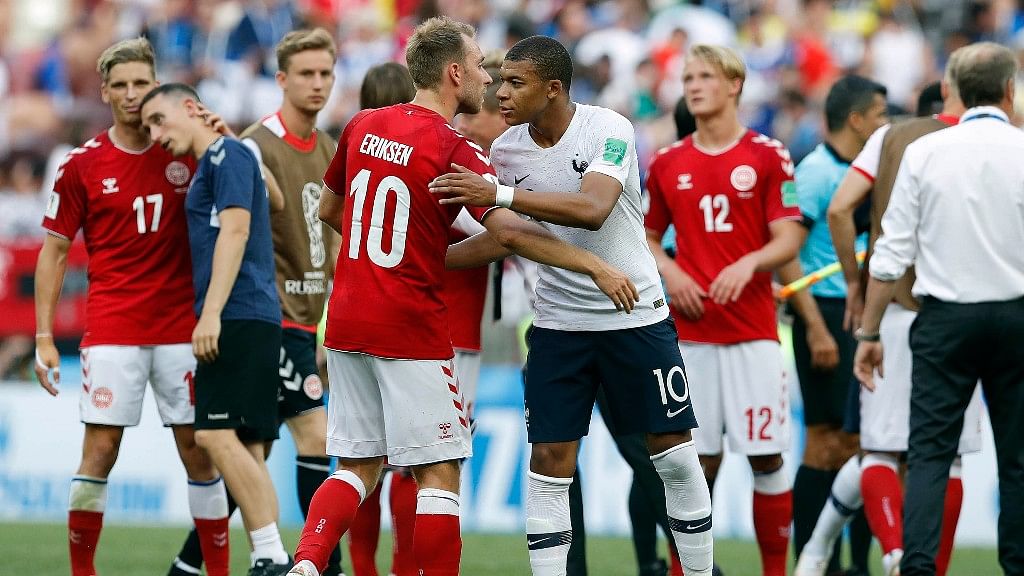Denmark’s Christian Eriksen and France’s Kylian Mbappe after their Group C at the  Luzhniki Stadium on Tuesday.