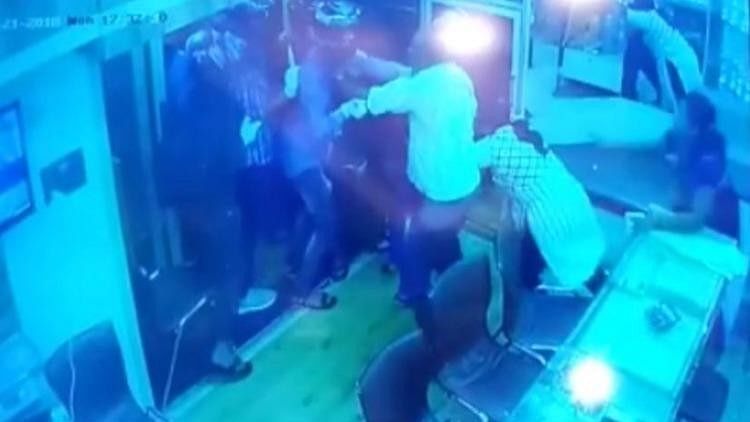 CCTV footage of two women helping their dad shove an armed gang of robbers out of their jewellery store in Jayanagar, Bengaluru.