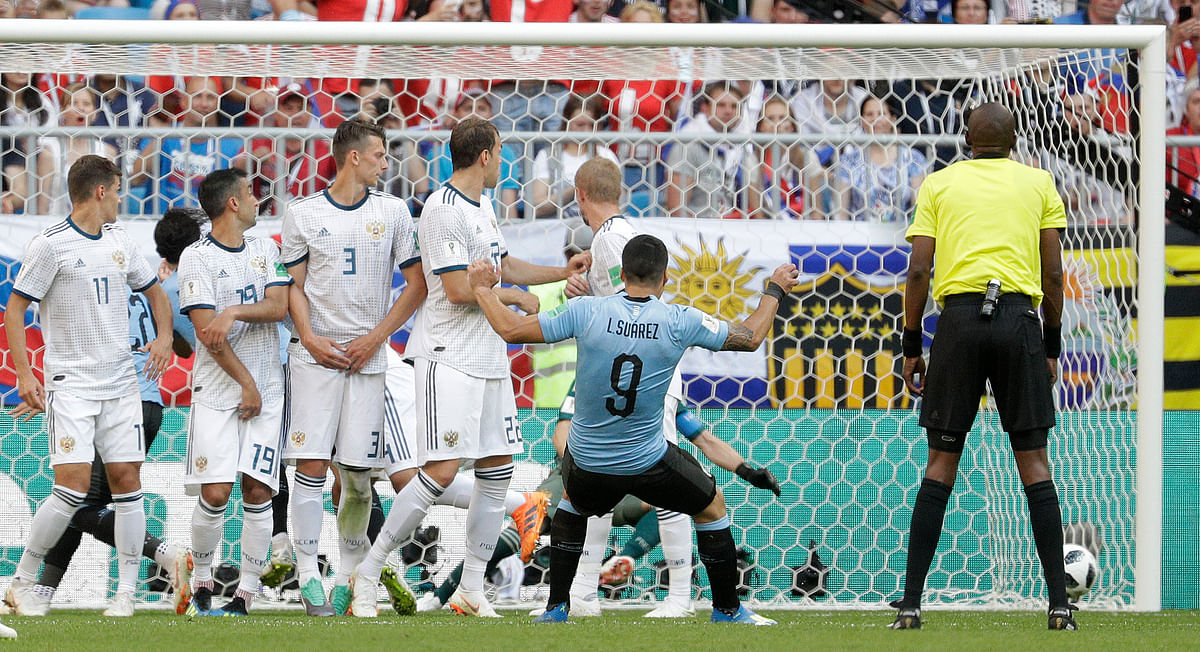 Suarez opened the scoring in the 10th minute with his seventh World Cup goal.