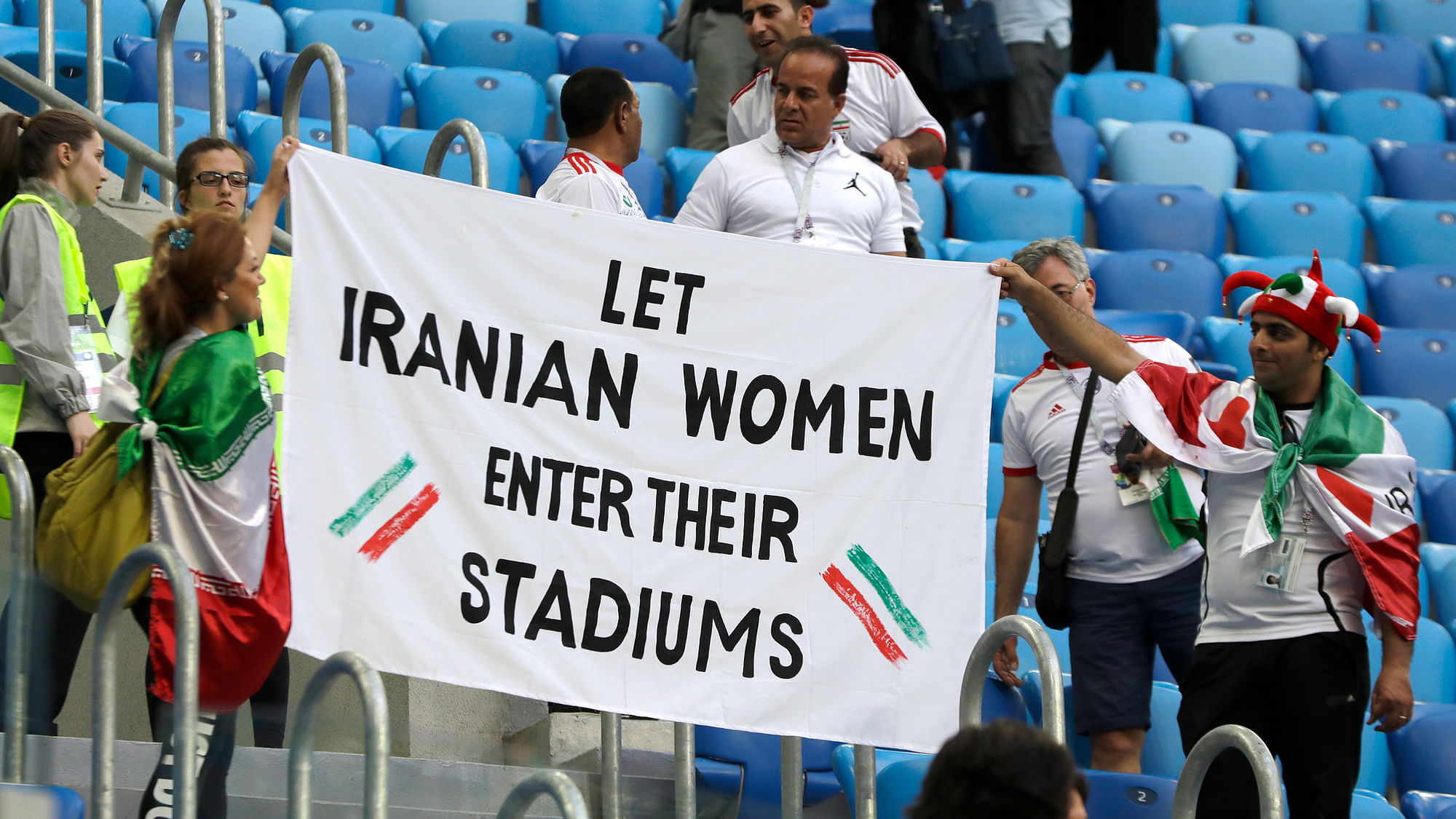 People supporting Iranian women hold a banner in the stands during the group B match between Morocco and Iran at the 2018 soccer World Cup in the St. Petersburg Stadium in St. Petersburg, Russia, Friday, June 15, 2018.&nbsp;