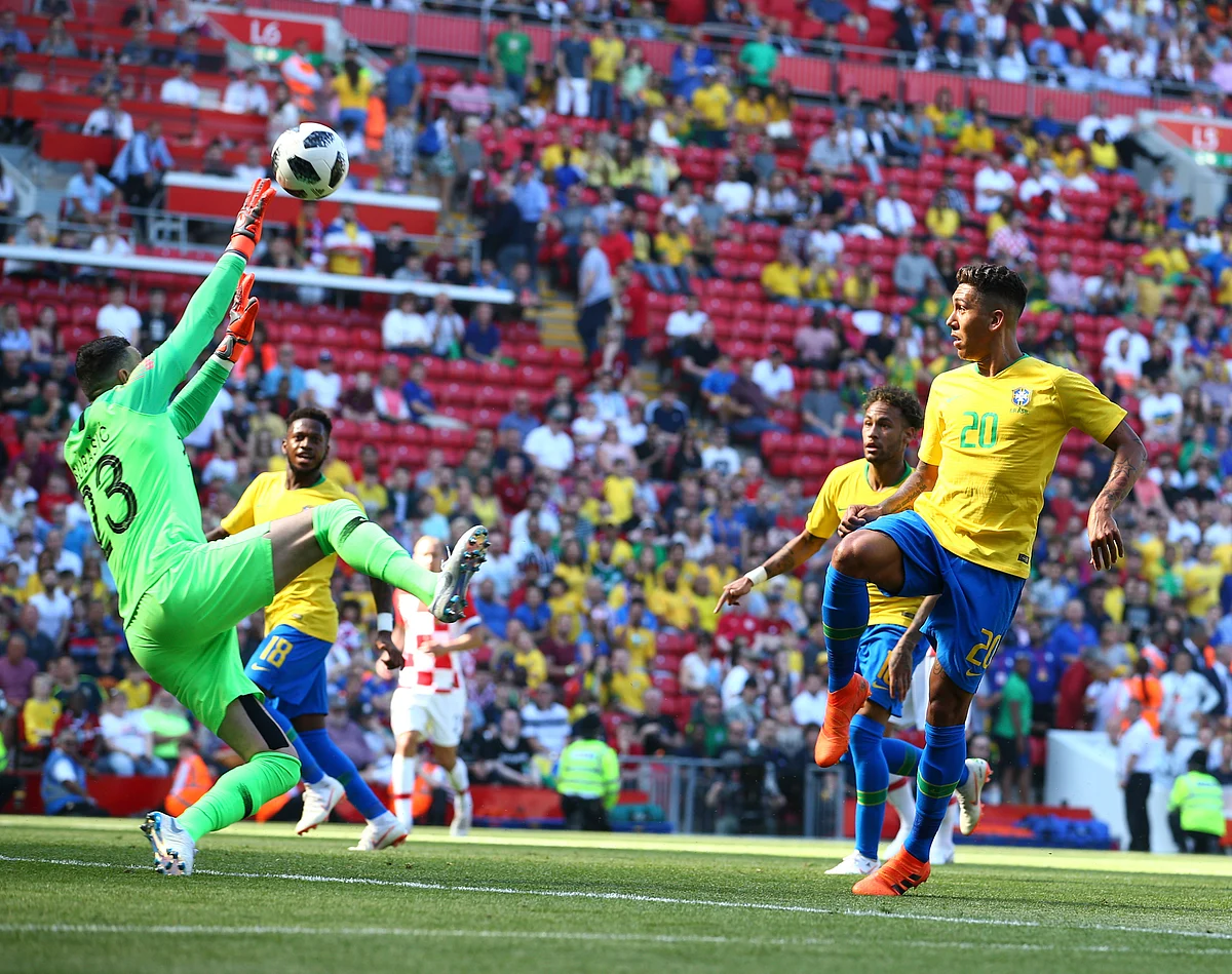 Croatia’s Danijel Subasic, left, fails to stop a goal by Brazil’s Neymar, second from right, during the friendly soccer match between Brazil and Croatia.