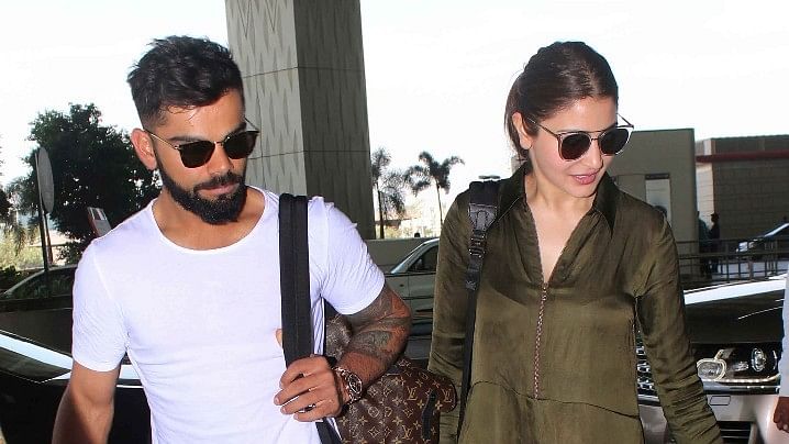 File photo of Virat and Anushka at the airport.
