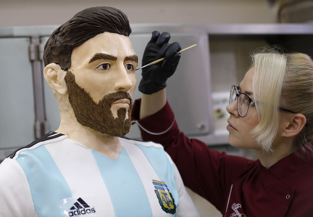 Confectioners in Moscow build life-size chocolate sculpture of Messi for his birthday.