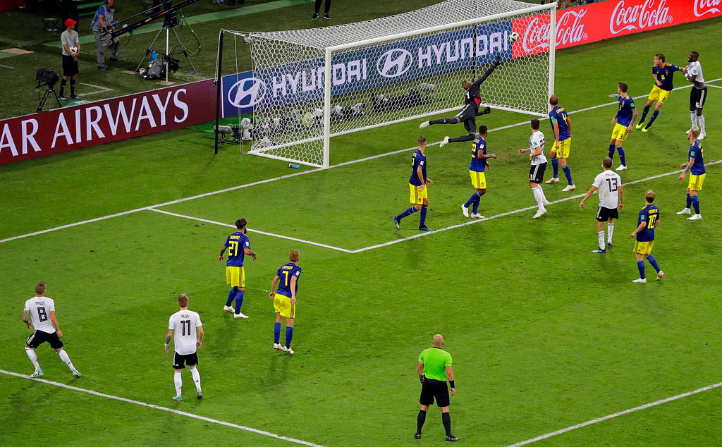 A dramatic stoppage-time goal from Toni Kroos gave holders Germany a 2-1 win over Sweden on Saturday. 