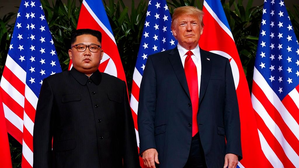 Both Kim Jong-un and Donald Trump sought to project a sense of command as they began a historic summit in Singapore. 