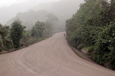 CHIMALTENANGO, June 4, 2018 (Xinhua) -- A person walks on the road covered by ashes during the eruption of the "Volcan de Fuego", in Acatenango, Chimaltenango Department, Guatemala, on June 3, 2018. At least seven people have been killed and 296 others injured in Guatemala as a highly active volcano near the country