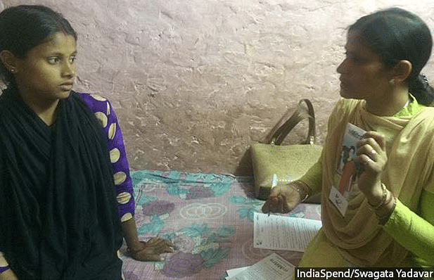 Health supervisor Daya Pandey telling Sushma Paswan, 24, about mMitra service in the latter’s home in West Delhi’s Sagarpur area. mMitra is a free pre-recorded voice-message service that gives pregnant women information about taking care of themselves and their newborns.