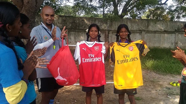 Chamundeswari and Anbarasi with their jerseys.