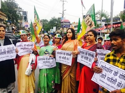 Ranchi: Jharkhand Vikash Morcha (JVM) activists stage a demonstration against the abduction and gang-rape of five women activists in Khunti district of Jharkhand; in Ranchi on June 22, 2018. The incident happened on June 19 where five women - four girls and a married woman- were abducted and gang-raped at gunpoint by at least half a dozen men while they were on a visit to to R.C. Mission School in Kochang village. The women were engaged in the campaign through nukkad natak (street plays) in the
