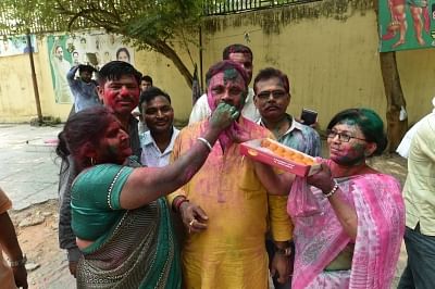 Lucknow: Rashtriya Lok Dal (RLD) workers celebrate after their party wrested the Kairana Lok Sabha seat from BJP in the bye election; at the party office in Lucknow on May 31, 2018. (Photo: IANS)