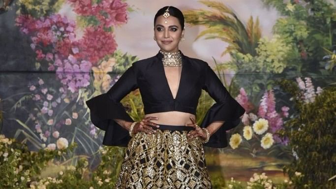 Swara Bhasker flaunts her black and gold combo at Sonam Kapoor’s wedding.