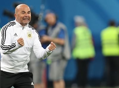 SAINT PETERSBURG, June 26, 2018 (Xinhua) -- Head coach Jorge Sampaoli of Argentina celebrates during the 2018 FIFA World Cup Group D match between Nigeria and Argentina in Saint Petersburg, Russia, June 26, 2018. Argentina won 2-1 and advanced to the round of 16. (Xinhua/Wu Zhuang/IANS)