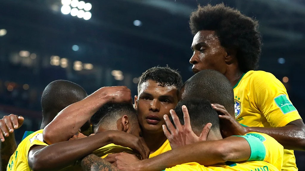 Brazil’s Thiago Silva (middle) celebrates with teammates after scoring his side’s second goal during their Group E match against Serbia at the Spartak Stadium on Wednesday.