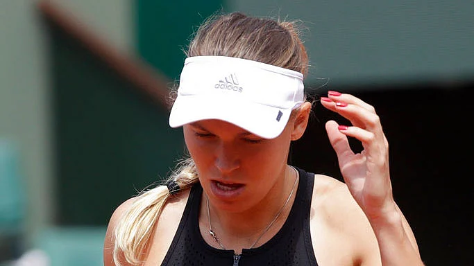 Denmark’s Caroline Wozniacki reacts as she plays Russia’s Daria Kasatkina in the fourth round of the French Open.