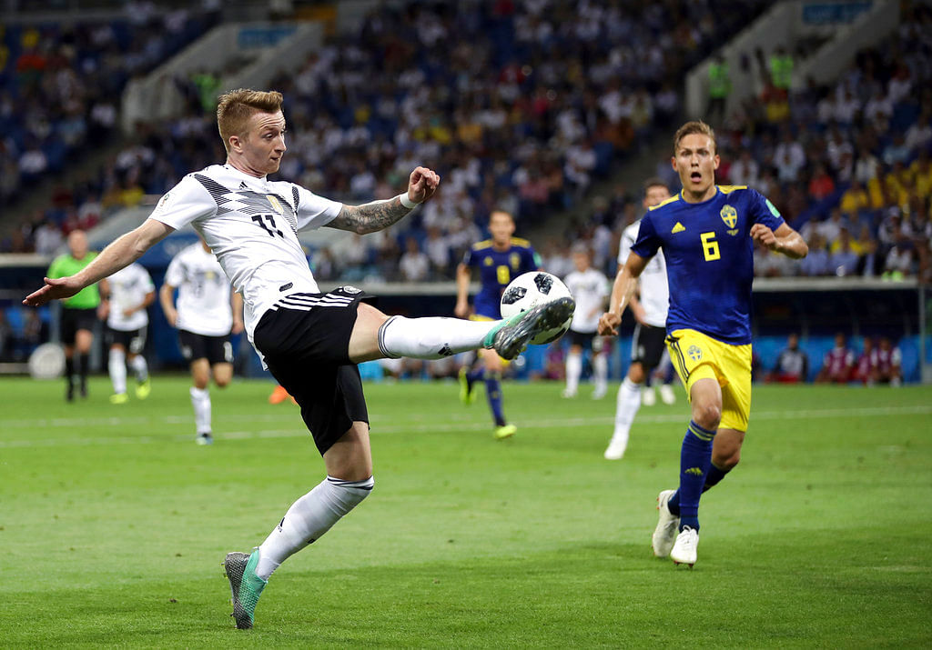 A dramatic stoppage-time goal from Toni Kroos gave holders Germany a 2-1 win over Sweden on Saturday. 