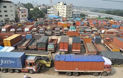 Bengaluru: Trucks remain off road as truckers go on a two-day nation-wide strike to press for their various demands including bringing diesel under the GST regime, in Bengaluru on Oct 9, 2017. The strike has halted the movement of goods across Karnataka. (Photo: IANS)
