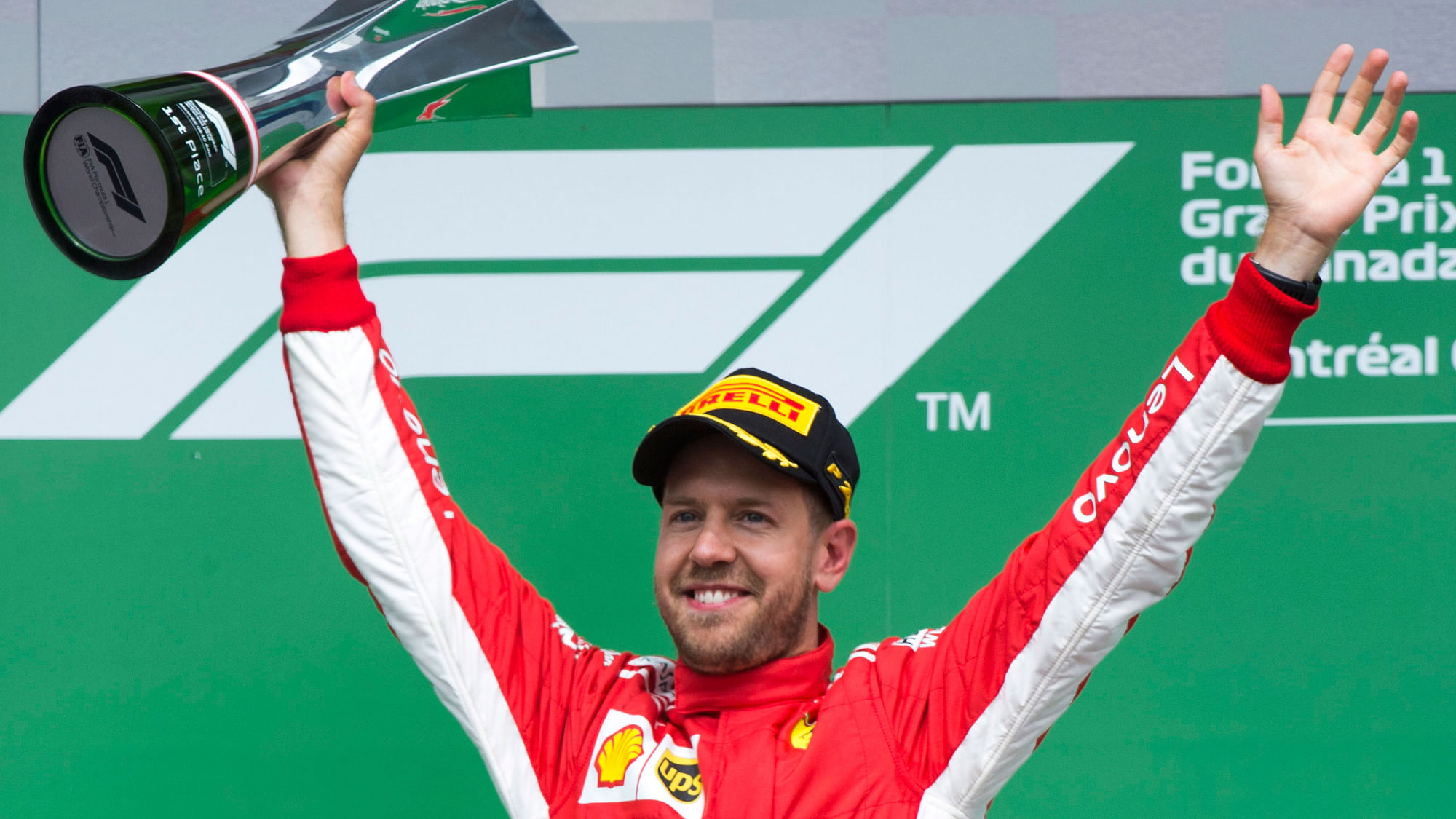 Ferrari driver Sebastian Vettel of Germany celebrates after winning the Canadian Grand Prix.
