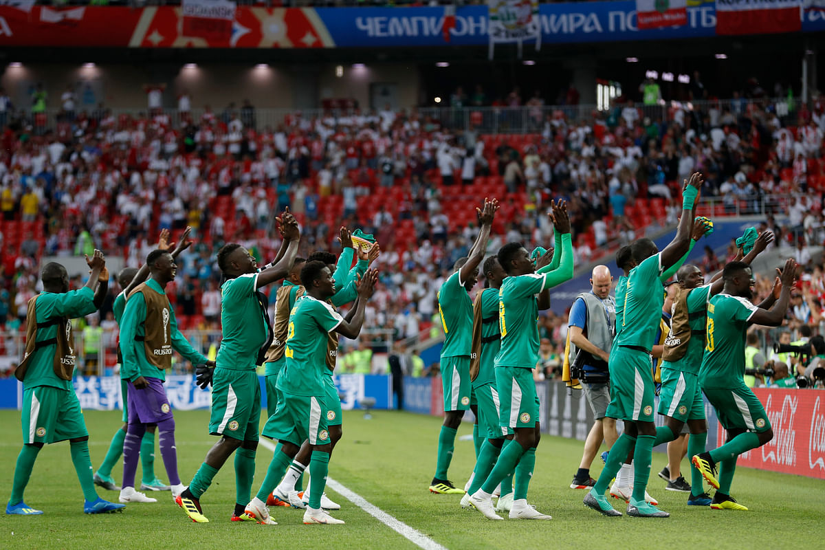 Senegal became the first African team to win at the 2018 FIFA World Cup, defeating Poland 2-1.