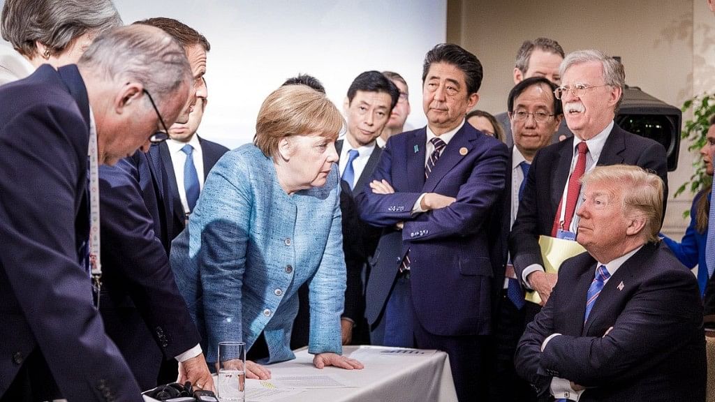 A photo tweeted by the German government spokesman @RegSprecher captured the mood, showing a seated Trump, arms crossed, surrounded by other leaders standing over him.