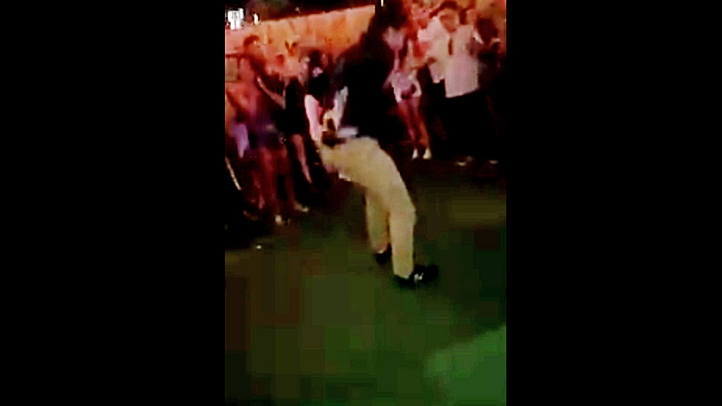 A screengrab from the video showing the FBI agent accidentally shooting a person while dancing.