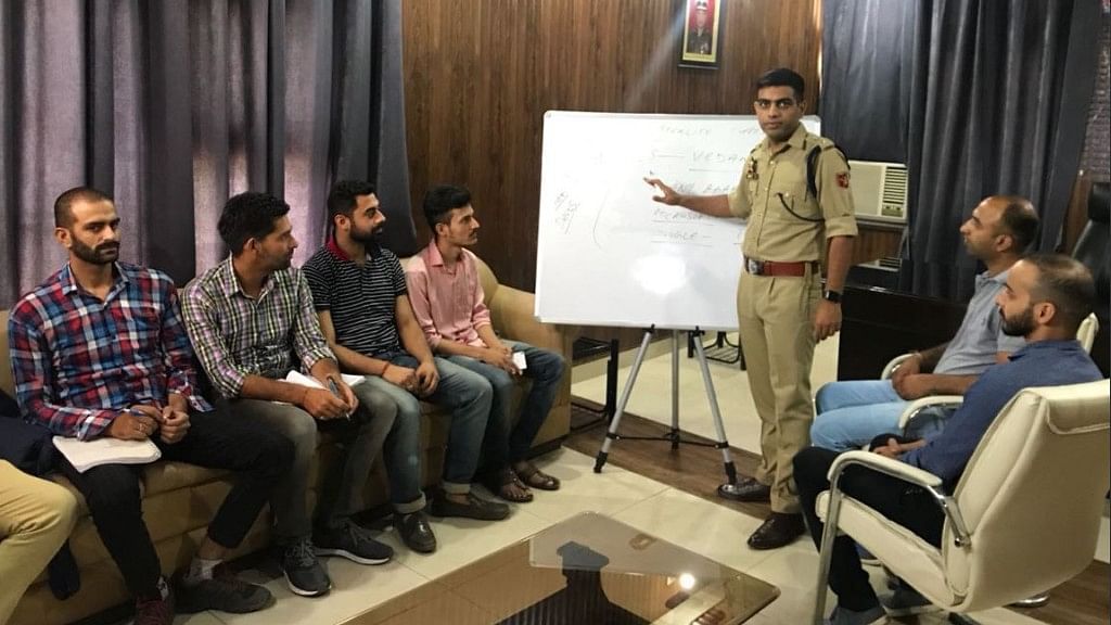 South Jammu Superintendent of Police Sandeep Chaudhary providing free coaching to young aspirants.