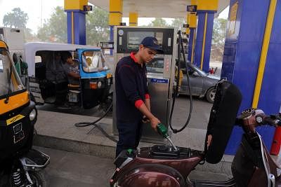CAIRO, June 16, 2018 (Xinhua) -- An employee fuels a motorbike at a fuel station in Cairo, Egypt, on June 16, 2018. Egypt on Saturday increased fuel prices by up to 66.6 percent to meet an International Monetary Fund (IMF) loan deal and push the implementation of economic reform plans, the Oil Ministry said in a statement. (Xinhua/Ahmed Gomaa/IANS)
