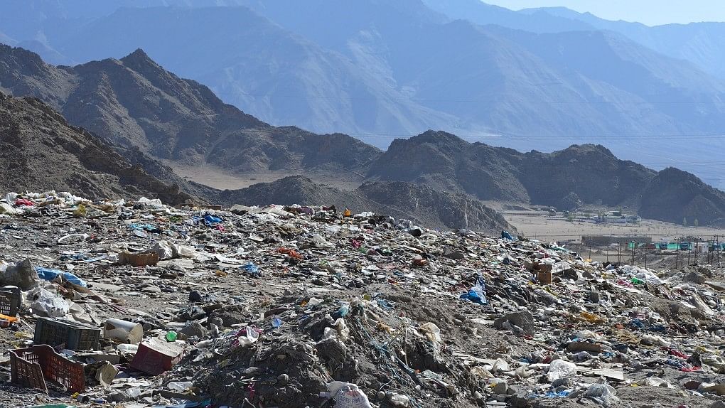 Solid waste lying at a large dump site, Bomgard, near Leh town. Locals said that waste often gets carried away by the wind and some of it ends up in the Indus.