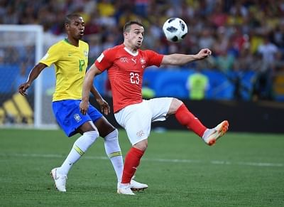 ROSTOV-ON-DON, June 17, 2018 (Xinhua) -- Fernandinho (L) of Brazil vies with Xherdan Shaqiri of Switzerland during a group E match between Brazil and Switzerland at the 2018 FIFA World Cup in Rostov-on-Don, Russia, June 17, 2018. The match ended in a 1-1 draw. (Xinhua/Li Ga/IANS)