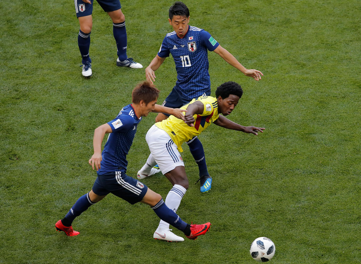 Japan beat Colombia 2-1 to become the first team from Asia to beat a South American country at the FIFA World Cup.