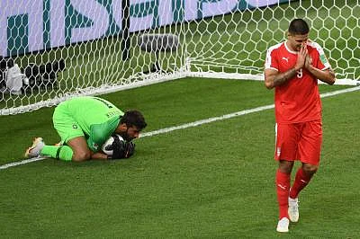 MOSCOW, June 27, 2018 (Xinhua) -- Aleksandar Mitrovic (R) of Serbia reacts during the 2018 FIFA World Cup Group E match between Brazil and Serbia in Moscow, Russia, June 27, 2018. Brazil won 2-0 and advanced to the round of 16. (Xinhua/Wang Yuguo/IANS)