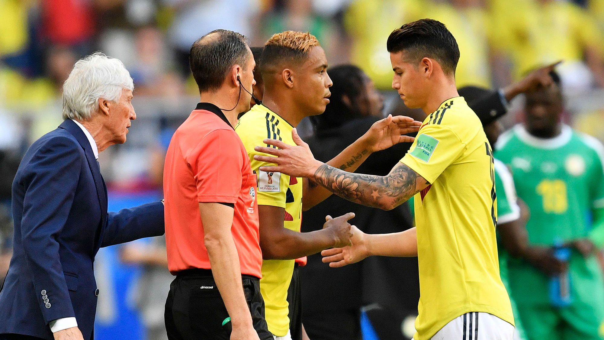 Colombia’s James Rodriguez, right, is replaced by Colombia’s Luis Muriel, center, as Colombia head coach Jose Pekerman, left, looks on during the group H match between Senegal and Colombia, at the 2018 soccer World Cup in the Samara Arena in Samara, Russia.