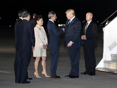 Trump arrives in Singapore for summit with Kim