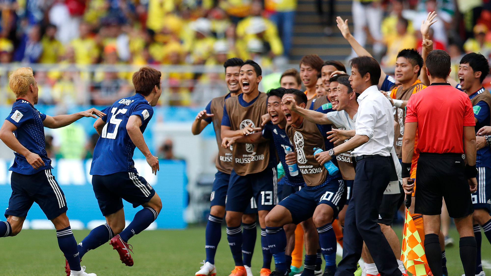 Japan’s Yuya Osako, centre, celebrates with teammates after scoring his side’s second goal during the group H match between Colombia and Japan at the 2018 soccer World Cup in the Mordavia Arena in Saransk, Russia.