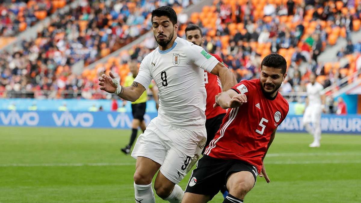 Uruguay’s Luis Suarez and Egypt’s Sam Morsy during the Group A match of the 2018 FIFA World Cup.