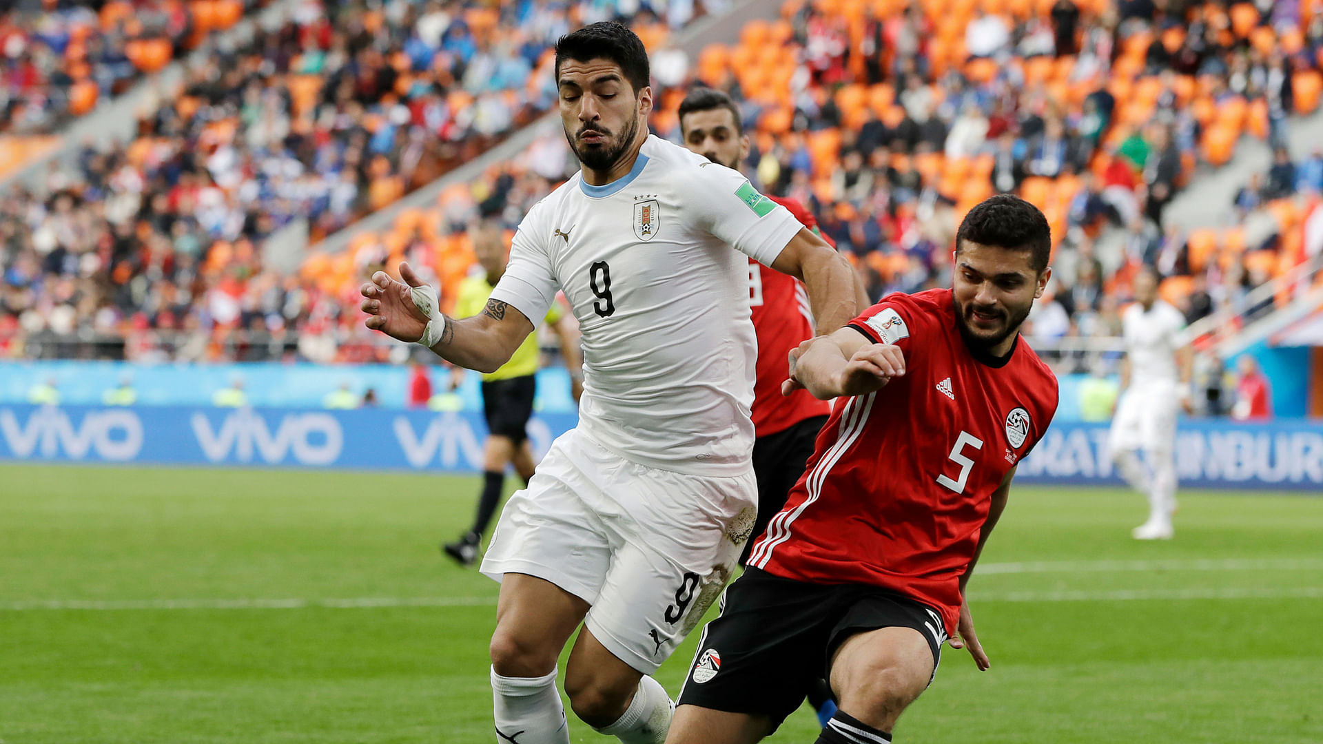 Uruguay’s Luis Suarez,  challenges for the ball with Egypt’s Sam Morsy during the group A match between Egypt and Uruguay at the 2018 FIFA World Cup.