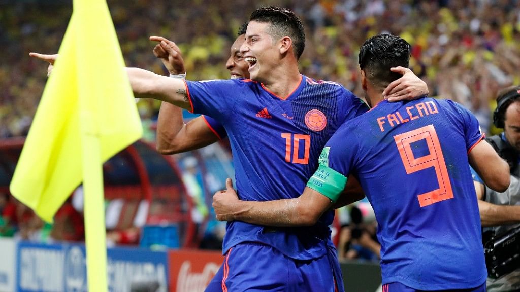 Colombia’s Radamel Falcao (right) celebrates with teammates after scoring their second goal during their Group H match against Poland at the  Kazan Arena on Sunday.