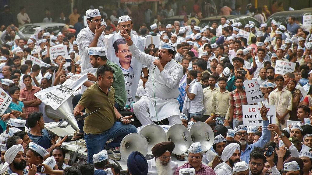 AAP leader Sanjay Singh with party leaders and workers during a protest as they marched towards the Lt Governor’s residence, in New Delhi on Wednesday, June 13, 2018