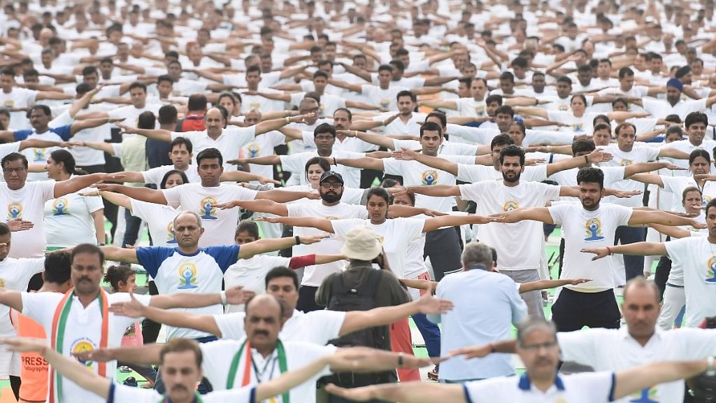 Volunteers practice yoga during a mass  session on the 4th International Yoga Day in New Delhi. Image used for representational purposes only.