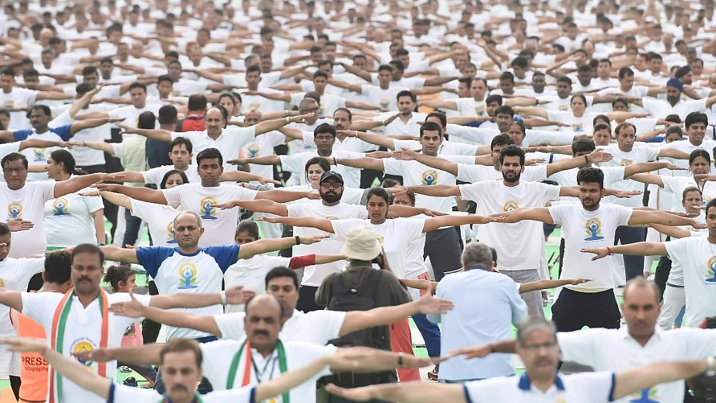 Volunteers practice yoga during a mass session on the 4th International Yoga Day in New Delhi. Image used for representational purposes only.